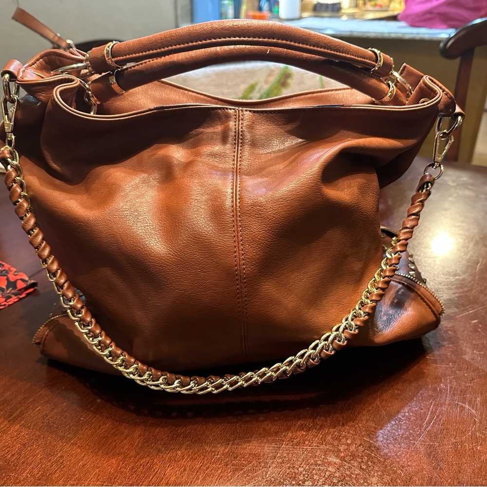 Ladies brown and gold leather purse $20